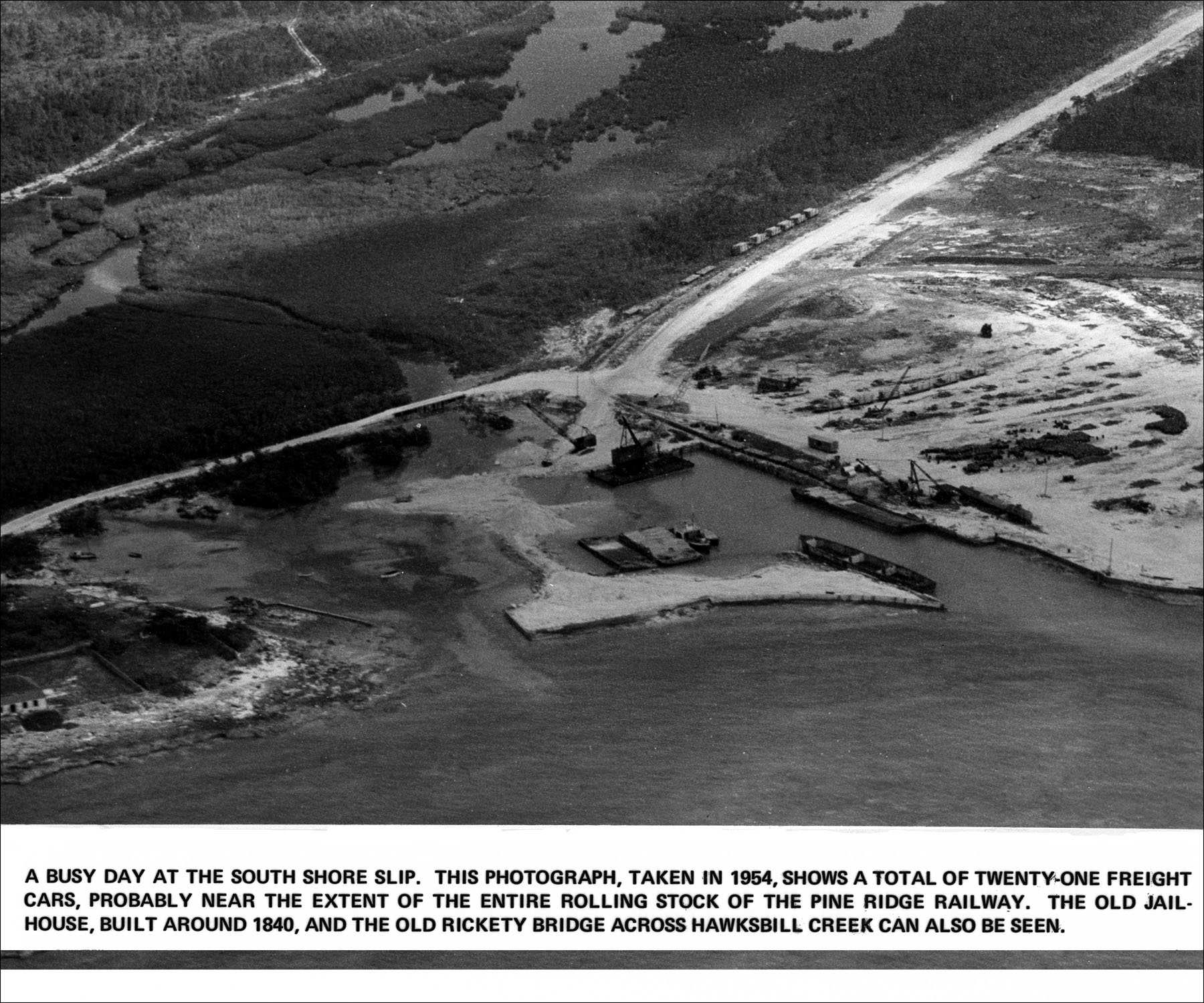 Aerial view of loading lumber at Harbour, 1954